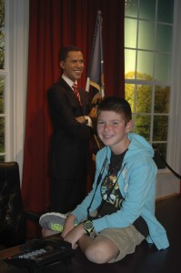 Visiting the Oval Office (in London) and sitting on President Obama's desk!